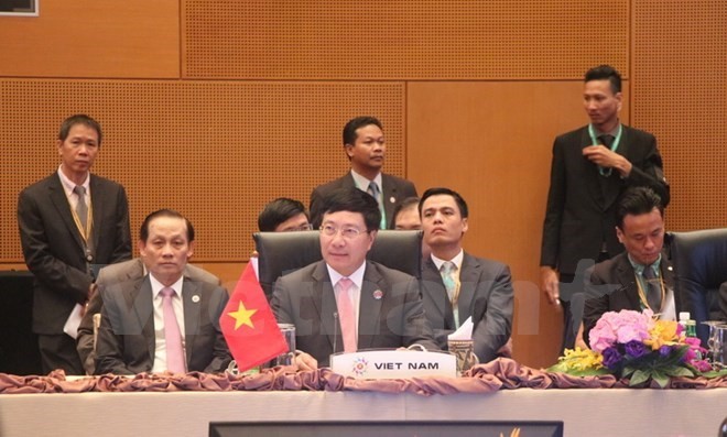 Foreign ministerial-level meetings held to prepare for ASEAN Summit - ảnh 1